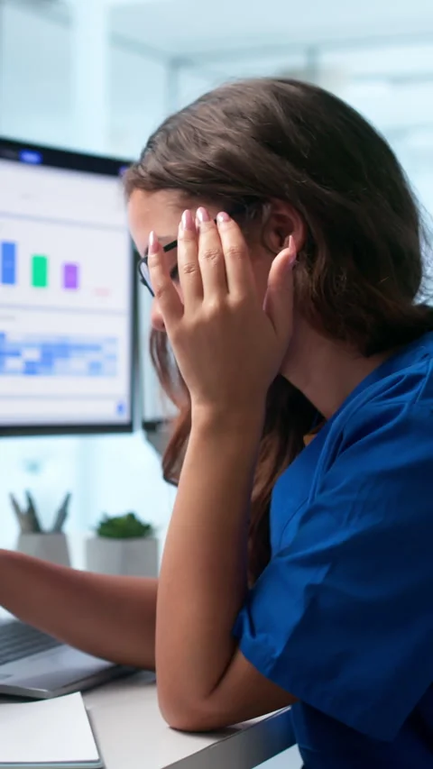 Healthcare Coder Reviews Clinical Billing Data On Laptop Video stock 345335083