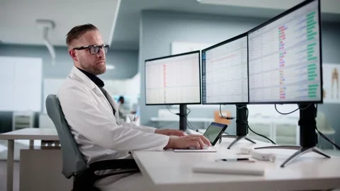 Healthcare Coding Audit Using Computer System Stock Footage 321547655