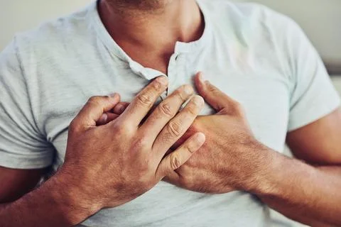 Healthcare, heart attack and man with chest pain, sickness or cardiovascular Stock Photos