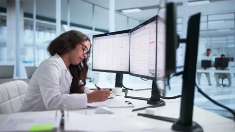 Healthcare Manager Efficiently Using Computer Software Stock Footage 345863099