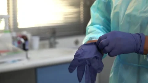 Healthcare Worker Preparing for Procedure Stock Footage 314521008