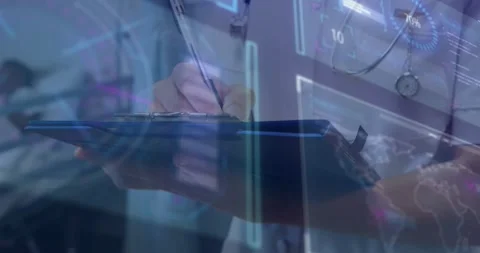 Healthcare worker using stylus on tablet, writing and comparing notes against Stock Footage 317600564