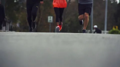 Healthy &amp; Active Group Running / Jogging In Slow Motion Urban Scene Stock Footage 132235690