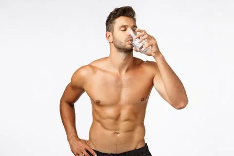 Healthy, active lifestyle and fitness concept. Charming, sexy male fitness Stock Photos