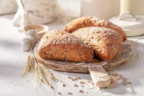 Healthy and hot triangular buns baked in the bakery. Stock Photos