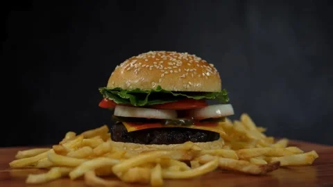 Healthy appetizing beef burger with keto gluten free bun, melted cheese, food, Stock Footage 336578436