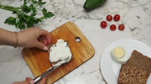 Healthy avocado toasts with rye bread, sliced avocado, eggs, cottage Stock Footage 272157974