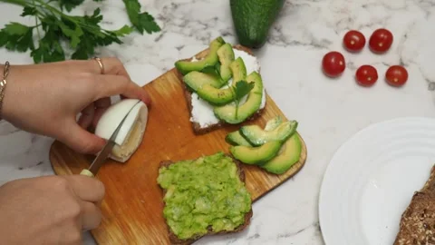 Healthy avocado toasts with rye bread, sliced avocado, eggs, cottage Stock Footage 272158133