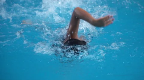 Healthy boy front crawl swims slow motion in swimming pool Stock Footage 68030723
