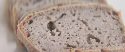 Healthy bread slices made with buckwheat flour 4K scope video Stock Footage 323788925