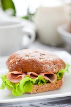 Healthy breakfast with bread roll on the table Foto stock