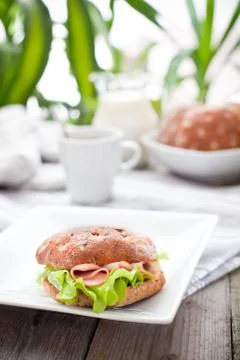 Healthy breakfast with bread roll on the table Stock-Fotos
