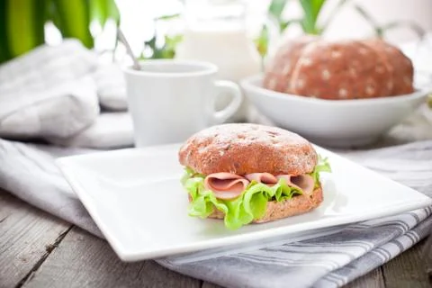 Healthy breakfast with bread roll on the table Foto stock