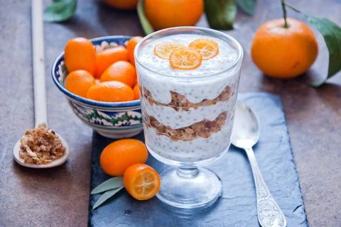 Healthy breakfast - Chia Seed Pudding with kumquats and granola Stock Photos