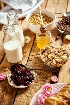 Healthy breakfast with different types of breakfast cereal with honey marmala Stock Photos