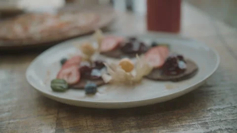 Healthy breakfast fresh grapefruit and pancakes with blueberries, strawberries Stock Footage 103246002
