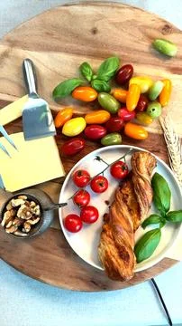 Healthy breakfast Rustic breadstick, fresh cherry tomatoes, mixed tomatoes Stock Photos