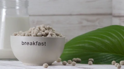 Healthy Breakfast on the table. crispy balls with milk Stock Footage 92489539