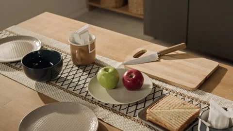 Healthy Breakfast Table Featuring Fresh Apples Sandwiches with Coffee Stock Footage 338054733