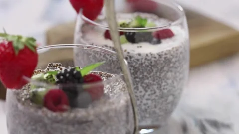 Healthy chia seed pudding with fresh berries and kiwi Stock-Footage 333739284