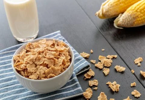 Healthy Corn Flakes with milk for Breakfast on table, food and drink Stock Photos