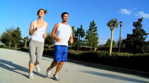 Healthy Couple Jogging Exercise Stock Footage 3804923