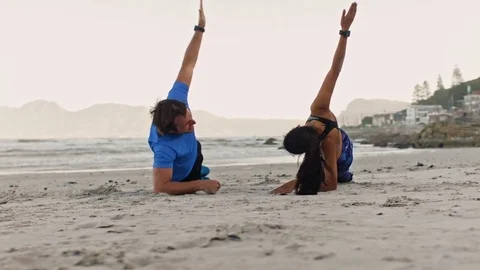 Healthy couple working out on beach Video stock 76521645
