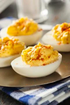 Healthy deviled eggs as an appetizer Stock Photos