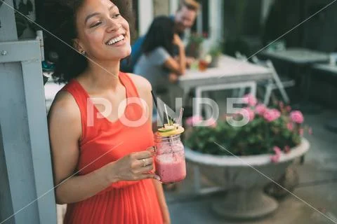 Healthy drinks, diet and people concept. Close up of beautiful afro woman Stock Photos