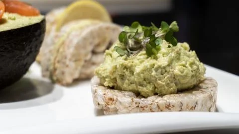 Healthy Eating - Crispy Rye Bread and Avocado Stock Photos