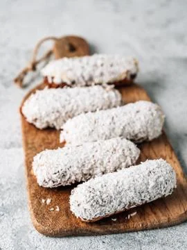 Healthy eclairs with coconut, vertical 스톡 사진