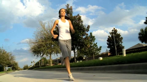 Healthy Female Jogging Exercise Stock Footage