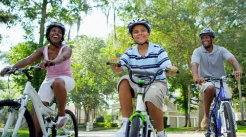 Healthy Fit Ethnic Family Cycling Suburban Roads Stock Footage