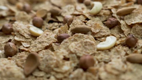 Healthy Flakes with Nuts, Close-up, Rotate. Isolated Background of Fitness Flake Stock Footage 149480983
