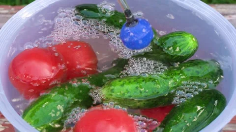Healthy food concept. Processing vegetables with ozone. Vegetables in the wat Stock Footage 145120875