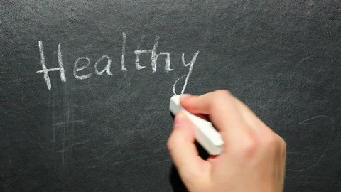 Healthy food - hand write text with chalk on blackboard Stock Footage 94038529