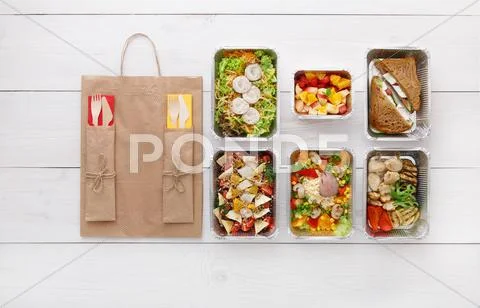 Healthy Food Take Away In Boxes, Top View At Wood