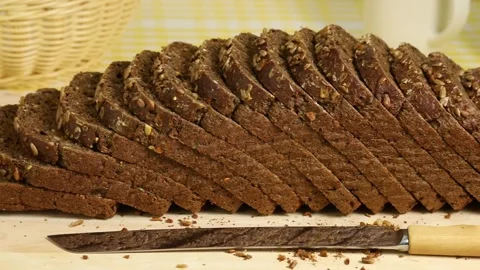 Healthy fresh baked dark multi grain bread close up Stock Footage 172143549