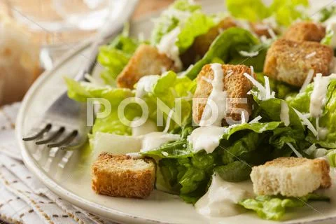Healthy green organic caesar salad Stock Photos