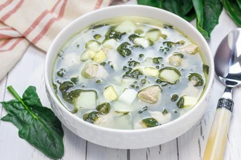 Healthy green soup with spinach meat, potato and egg (green borscht) 스톡 사진