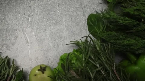 Healthy green vegetables on concrete surface Stock Footage 294750742