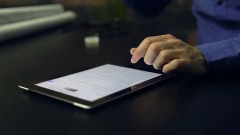 Healthy juice drinking while using tablet Stock Footage 85447255