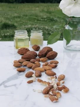 Healthy living, elements to make pruning for pains. Almonds, Beeswax. Foto stock