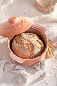 Healthy loaf of bread baked in a baking mold. Stock Photos