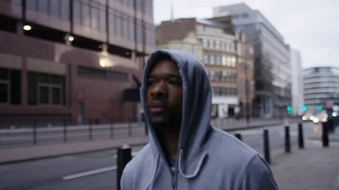 Healthy male jogging in the streets in the city one morning, in slow motion Stock Footage 84330715