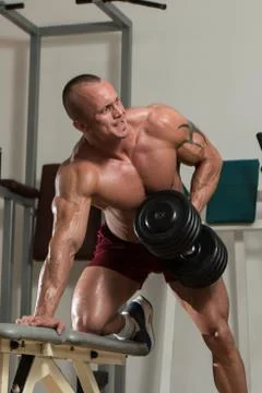 Healthy man doing exercise for back Stock Photos