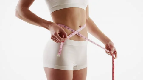 Healthy mixed race woman with measuring waist Stock Footage