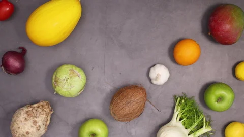 Healthy pattern made of blink fresh organic fruits and vegetables. Stop motion Stock Footage 154522800