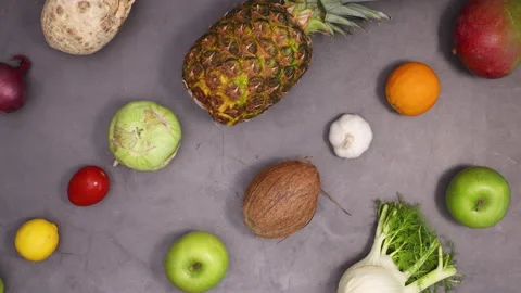 Healthy pattern made of fresh organic fruits and vegetables move. Stop motion Stock Footage 154522676