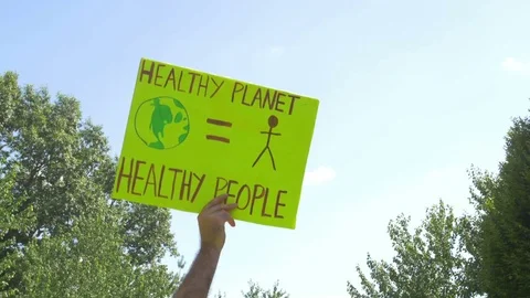 Healthy planet environmental sign protest Stock Footage